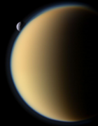 Tethys behind Titan.png