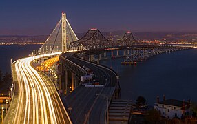 (June 2016) Eastern span of the San Francisco–Oakland Bay Bridge, with the old and the new bridge, as seen from Yerba Buena Island to Oakland