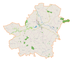 Mapa konturowa gminy Kazimierza Wielka, blisko lewej krawiędzi znajduje się punkt z opisem „Gunów-Kolonia”