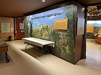 Interior of the nature center, featuring a variety of interactive nature exhibits