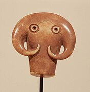 Amulette en forme de tête d'éléphant. Ivoire d'éléphant, H. 3,5 cm. Nagada II, 3800-3150 Haute-Égypte, fin de la période prédynastique.