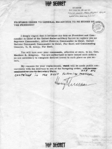 A typed document with hand-written corrections, signed "Harry Truman" and marked "Top Secret".