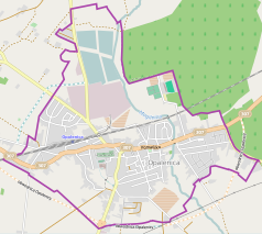 Mapa konturowa Opalenicy, blisko centrum na dole znajduje się punkt z opisem „Parafia pw. św. Mateuszaw Opalenicy”