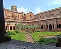 Vista del giardino del chiostro dell'Abbazia di Chiaravalle della Colomba, Alseno (PC), 2024.