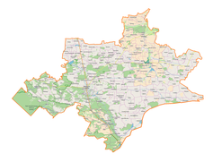 Mapa konturowa powiatu tomaszowskiego, blisko centrum po prawej na dole znajduje się punkt z opisem „Myślatyn”