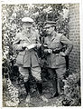 Two British staff officers wearing the officer's 1913 version of the Service Dress tunic, which featured an open collar revealing a shirt and tie below.