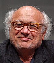 A smiling Danny DeVito