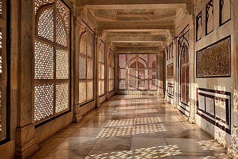 The Tomb of Hazrat Salim Chishti, a UNESCO World Heritage Site, is a mausoleum. It enshrines the burial place of the Sufi saint Salim Chisti, a descendant of Baba Farid, who lived in a cavern on the ridge at Sikri. Considered one of the finest examples of Mughal architecture in India, the mausoleum was built during the years 1580 and 1581 by Akbar, along with the imperial complex at Fatehpur Sikri near Zenana Rauza.