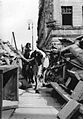 A barricade in Warsaw protecting civilians from enemy fire when crossing a street