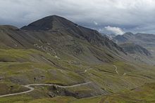 Mountain with road winding to its top