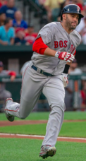 Boston had grand slams by J. D. Martinez (left) and Rafael Devers in Game 2.