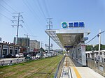 Sanyuan Road (Sanyuanlu), a typical street-level station of the system with green track in the station