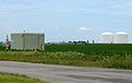 Image 4Peoples Gas Manlove Field natural gas storage area in Newcomb Township, Champaign County, Illinois. In the foreground (left) is one of the numerous wells for the underground storage area, with an LNG plant, and above-ground storage tanks are in the background (right). (from Natural gas)