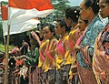 Image 27Timorese women with the Indonesian national flag (from History of Indonesia)