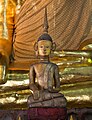 A Thai Lue Buddha statue in Wat Non Bua, Tha Wang Pha District, Thailand