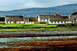 Ballyvaghan Cottages along a bay in front of Moneen Mountain (305) - geograph.org.uk - 3771728.jpg