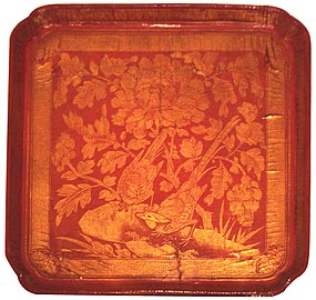 A red lacquerware tray with engraved gold foil decoration (12–13th century), from the Song dynasty