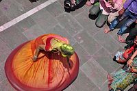 A play of colours then a dance at a Hindu temple near Mathura, at Holi.