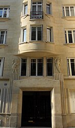 Art Deco reliefs of putti on Rue de Vaugirard no. 60, Paris, France, unknown architect, c.1930