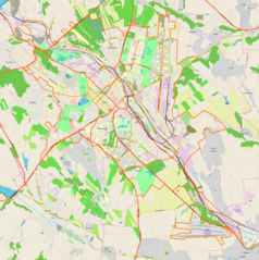 Mapa konturowa Kiszyniowa, blisko centrum na lewo u góry znajduje się punkt z opisem „Państwowy Uniwersytet Mołdawski”