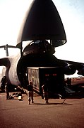 Tactical Airlift Control Element (TALCE) equipment from the 436th Airlift Wing, Dover AFB, DE is unloaded from a C-5 Galaxy after arriving at the airport. The TALCE will help contro - DPLA - 3944012c1789d7e29a07d75f56cab92d.jpeg