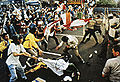 Image 16University students and police forces clash in May 1998 (from History of Indonesia)