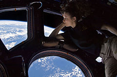 #2: Self portrait of Tracy Caldwell Dyson in the Cupola module of the International Space Station observing the Earth below during Expedition 24. (POTD) Tracy Caldwell Dyson (NASA)