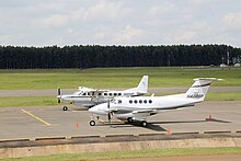 Two planes on the runway of Eldoret International Airport.