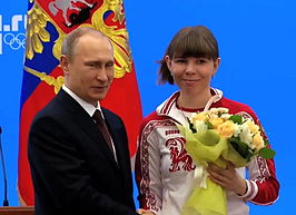 Sjoemilova (rechts) met president Poetin