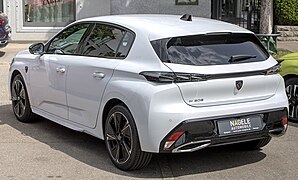 Peugeot e-308 - left rear view