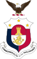 Arms of Manila as an inescutcheon on the coat of arms of the Philippine Commonwealth (right)