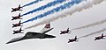 Image 73Concorde (and the Red Arrows with their trail of red, white and blue smoke) mark the Queen's Golden Jubilee. With its slender delta wings Concorde won the public vote for best British design. (from Culture of the United Kingdom)