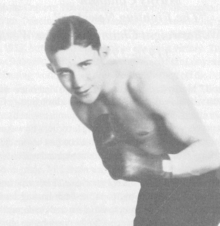 A young Mushy Callahan shown in a boxing stance.