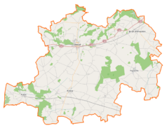 Mapa konturowa powiatu gostyńskiego, po lewej nieco na dole znajduje się punkt z opisem „Bączylas”