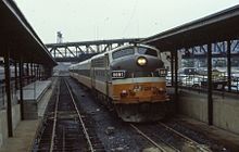 A train with a streamlined diesel locomotive