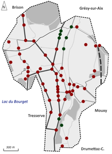 Carte en couleurs d'une ville avec des symboles représentant des carrefours.