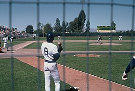 Ryne Sandberg swinging with Andre Dawson on deck. 1987. (36913516614).jpg