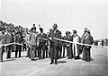 Image 3Ribbon ceremony to open the Sydney Harbour Bridge on 20 March 1932. Breaking protocol, the soon to be dismissed Premier Jack Lang cuts the ribbon while Governor Philip Game looks on. (from History of New South Wales)