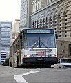 Muni trolleybus coming up a steep hill in San Francisco