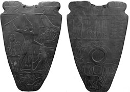 Paleta de Narmer, primera mención a una unificación del Antiguo Egipto por parte del faraón Narmer, fundador de la I dinastía