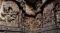 Exterior wall reliefs at Hoysaleshvara Temple. The temple was twice sacked and plundered by the Delhi Sultanate.[260]