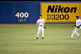 Vizquel settles under the short pop up. (8052441497).jpg