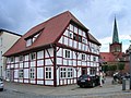 Half-timbered house of 1538 at the marketplace and the St Mary Church