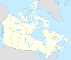 Mapa konturowa Kanady, blisko lewej krawiędzi nieco u góry znajduje się punkt z opisem „Dawson City”