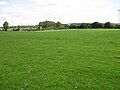 The main grassed area, with sports pitches in the distance