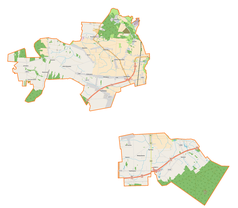 Mapa konturowa gminy wiejskiej Pabianice, blisko centrum po prawej na dole znajduje się punkt z opisem „Bychlew”