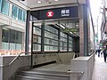 A subway in Hong Kong leading to an underground MTR station and shopping centres