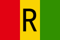 The 1962–2001 flag of Rwanda, a charged vertical triband.