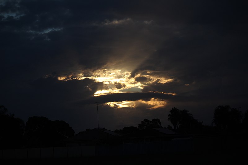 File:Sunlight peeking through the clouds.jpg