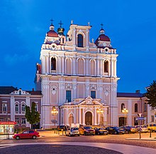 Exterior of a large, ornate, light-coloured church